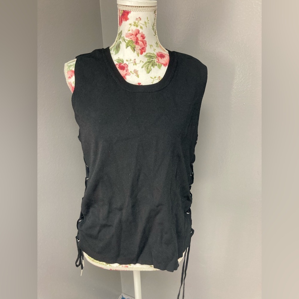 Rebel Wilson lace up sleeveless sweater